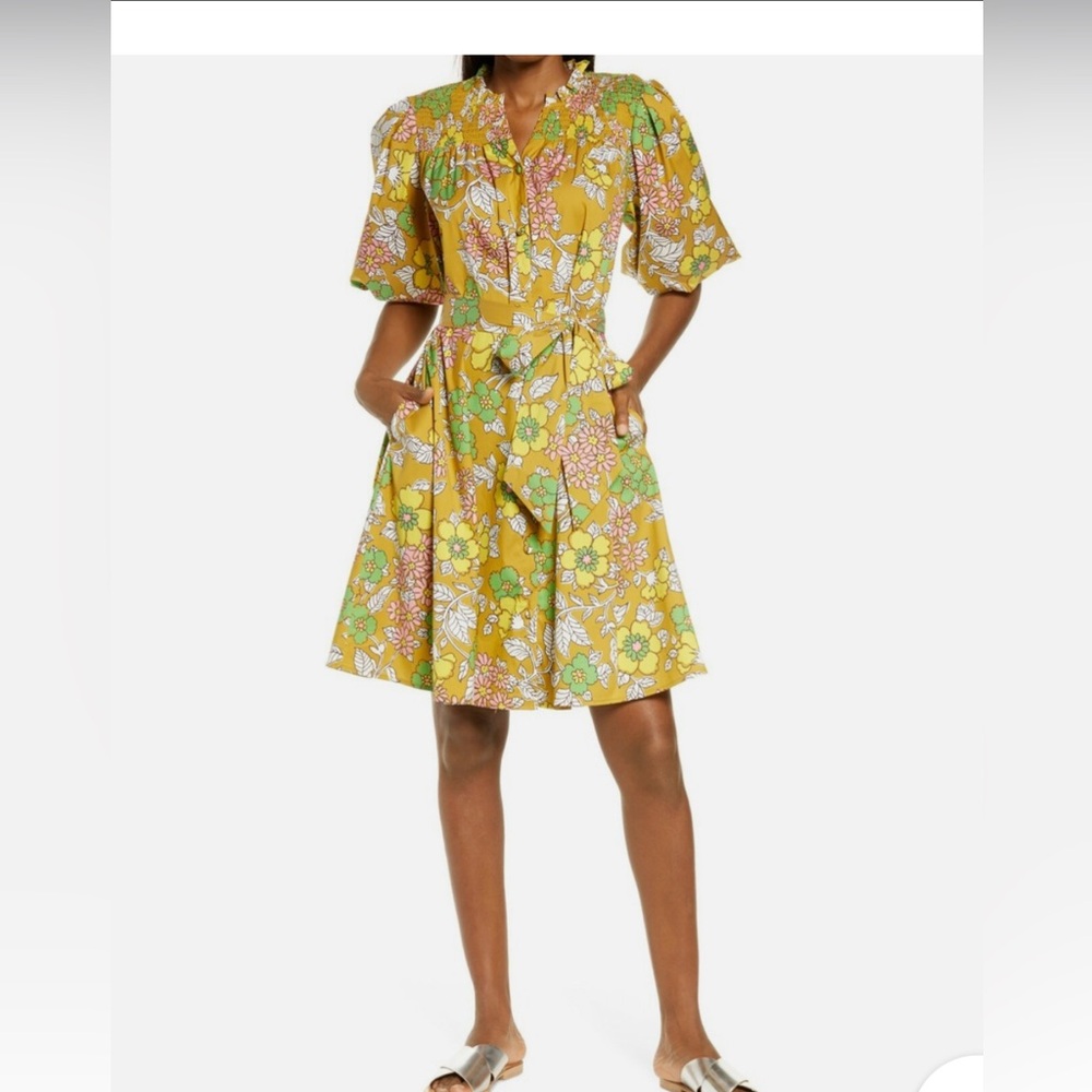 Tory Burch floral puff sleeve dress.